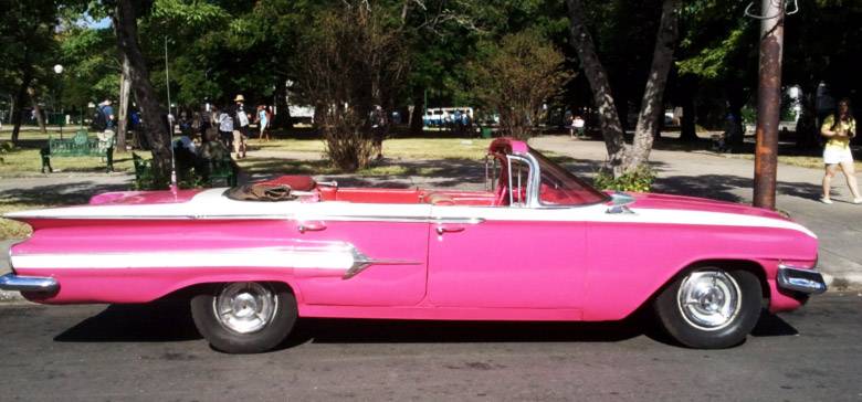 A Chevrolet Impala 1960 in Havana Cuba. This car was once a hardtop sedan but was converted to an open-top A Chevrolet Impala 1960 in Havana Cuba. This car was once a hardtop sedan but was converted to an open-top
