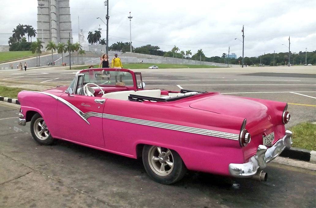 A pink 1956 Ford Fairlaine at the Plaza de Revolucion in Havana A pink 1956 Ford Fairlaine at the Plaza de Revolucion in Havana