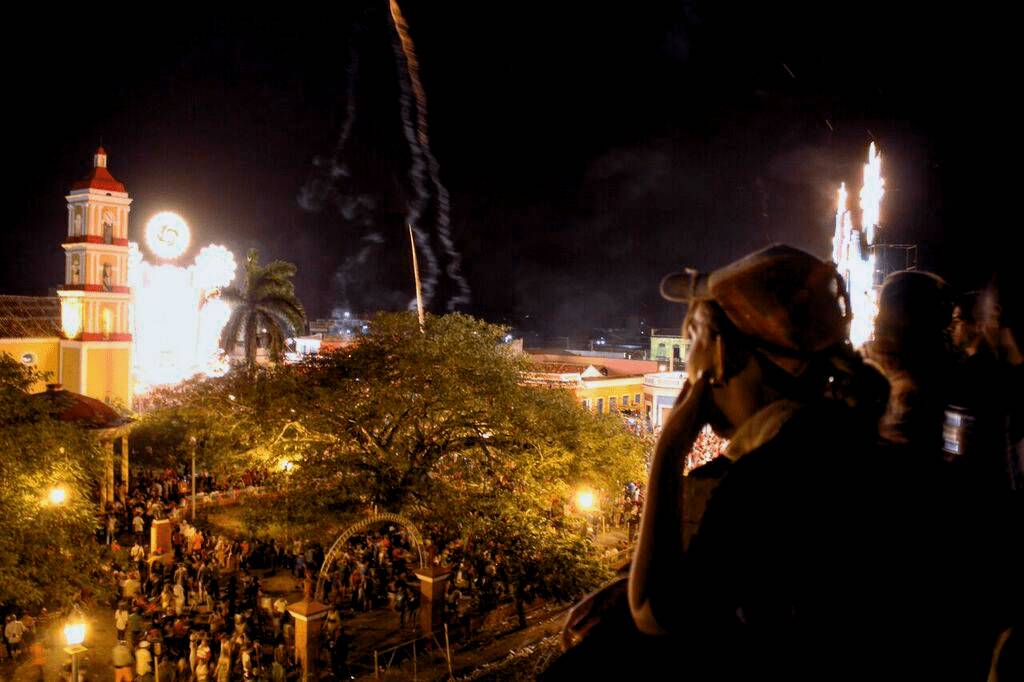A rooftop view over the Parrandas de Remedios festival A visitor to Cuba looking out over the Parrandas de Remedios festival from a rooftop.