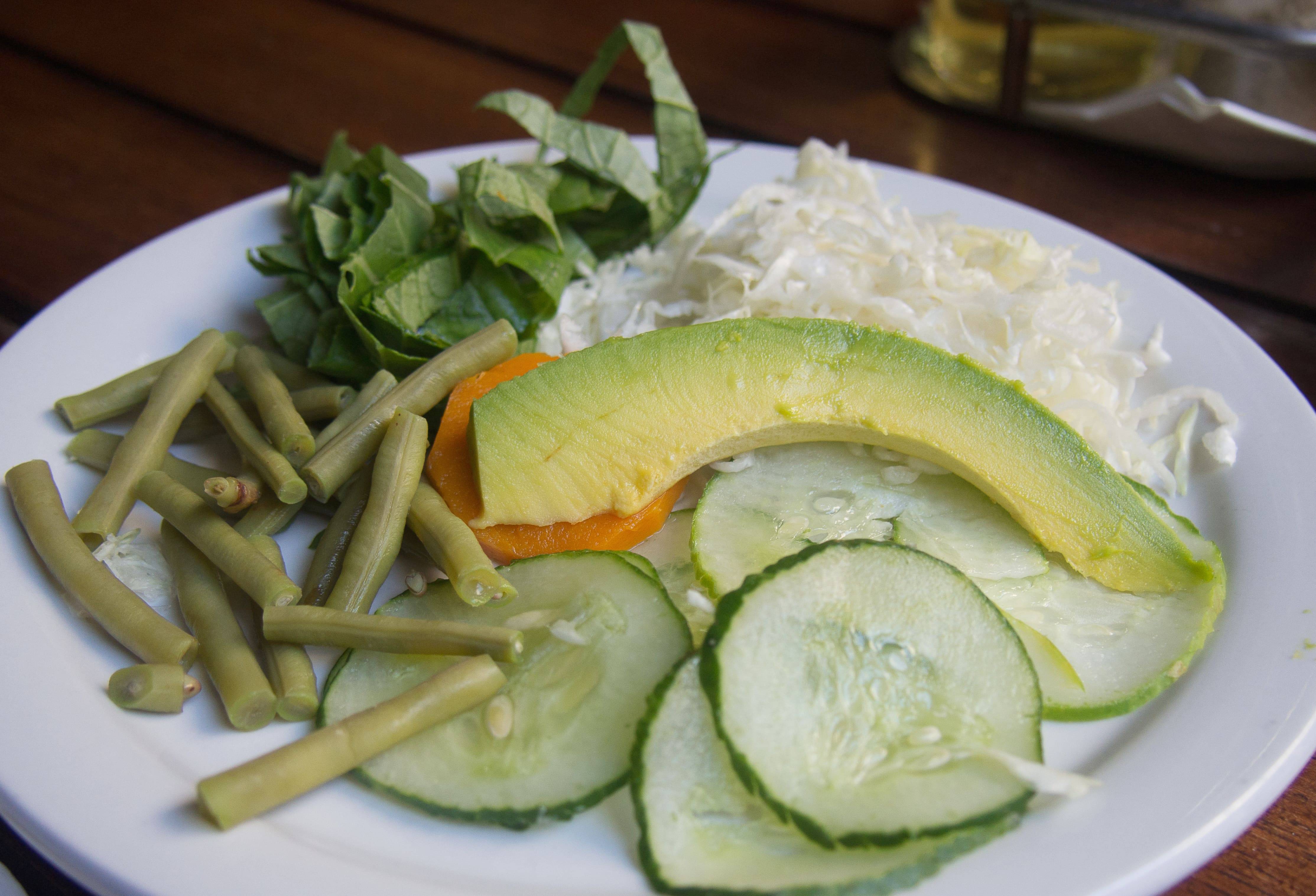 A salad in Cuba with cucumber, green beans, cabbage, and avocado A salad in Cuba with cucumber, green beans, cabbage, and avocado