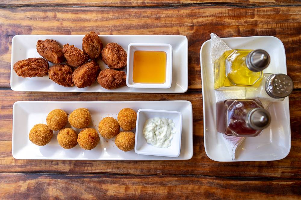 A snack dish at a restaurant in Cuba with croquetas and dips A snack dish at a restaurant in Cuba with croquetas and dips