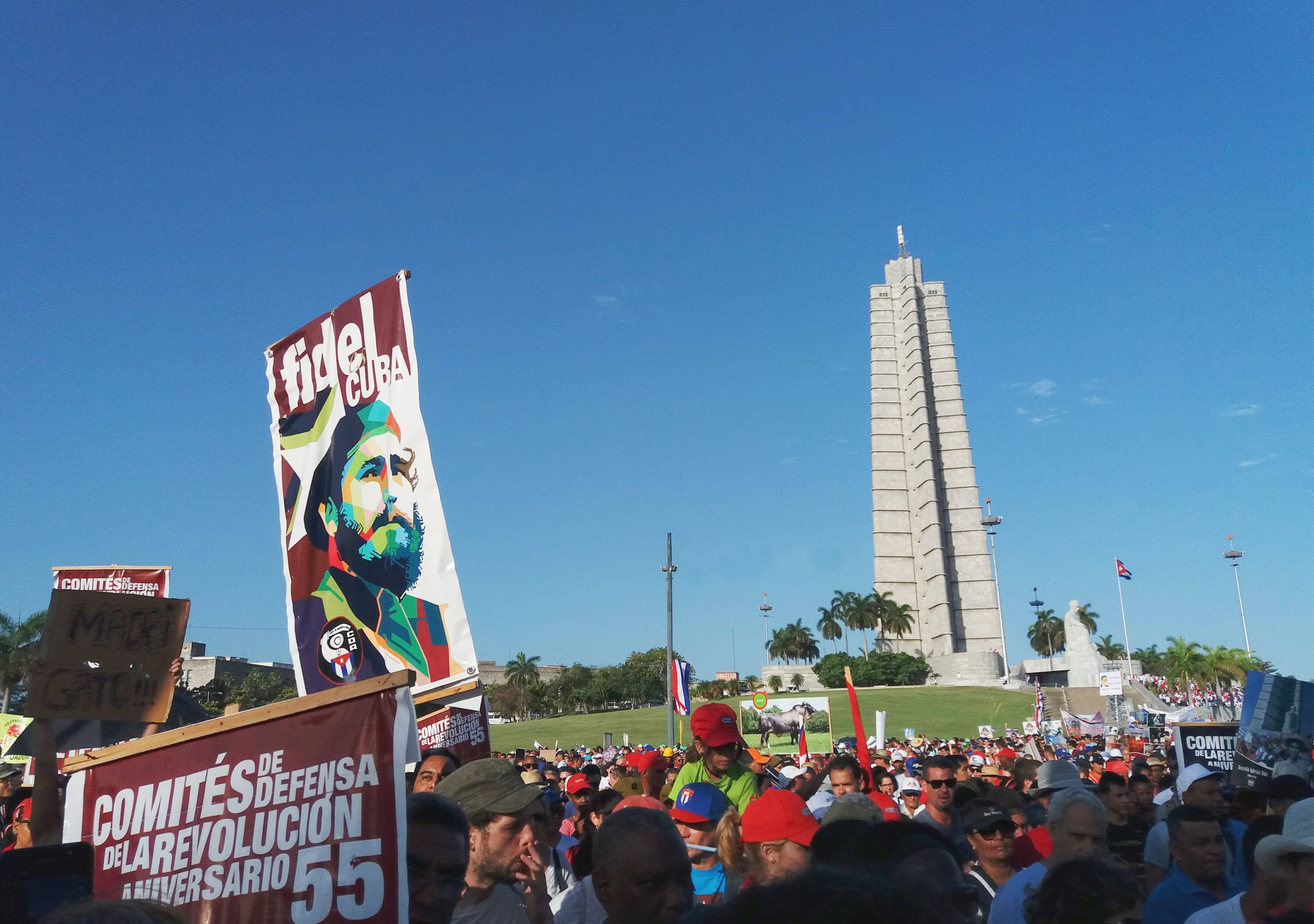A stylised image of Fidel with the Jose Marti memorial tower in the background. A view of the crowd and the Jose Marti memorial building at the May Day Parade in Havana