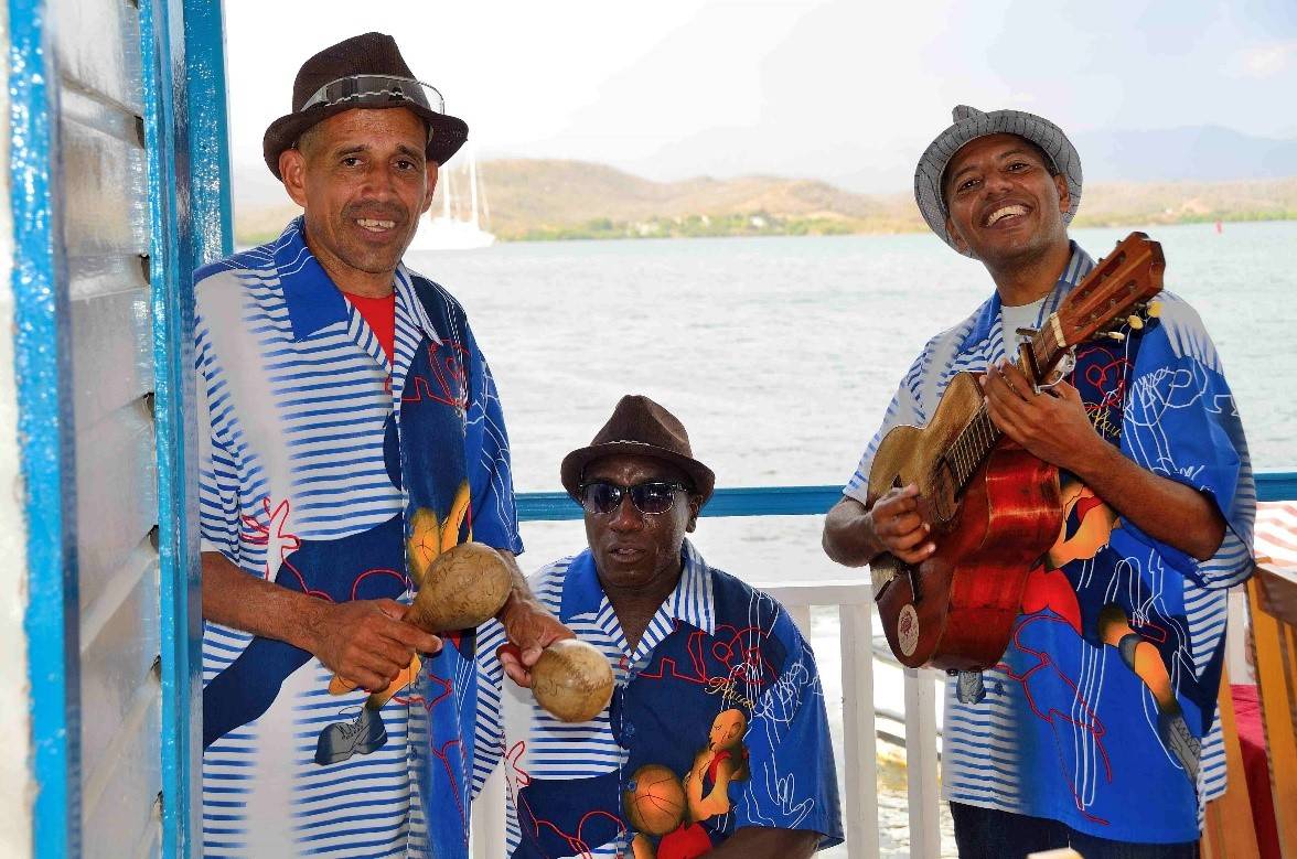 a trio of smiling musicians a trio of smiling musicians