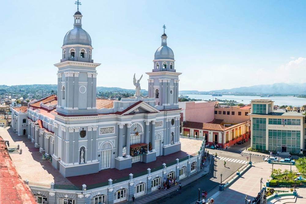 A view over the main square in Santiago de Cuba and the neo-classical Cathedral. A view over the main square in Santiago de Cuba and the neo-classical Cathedral.