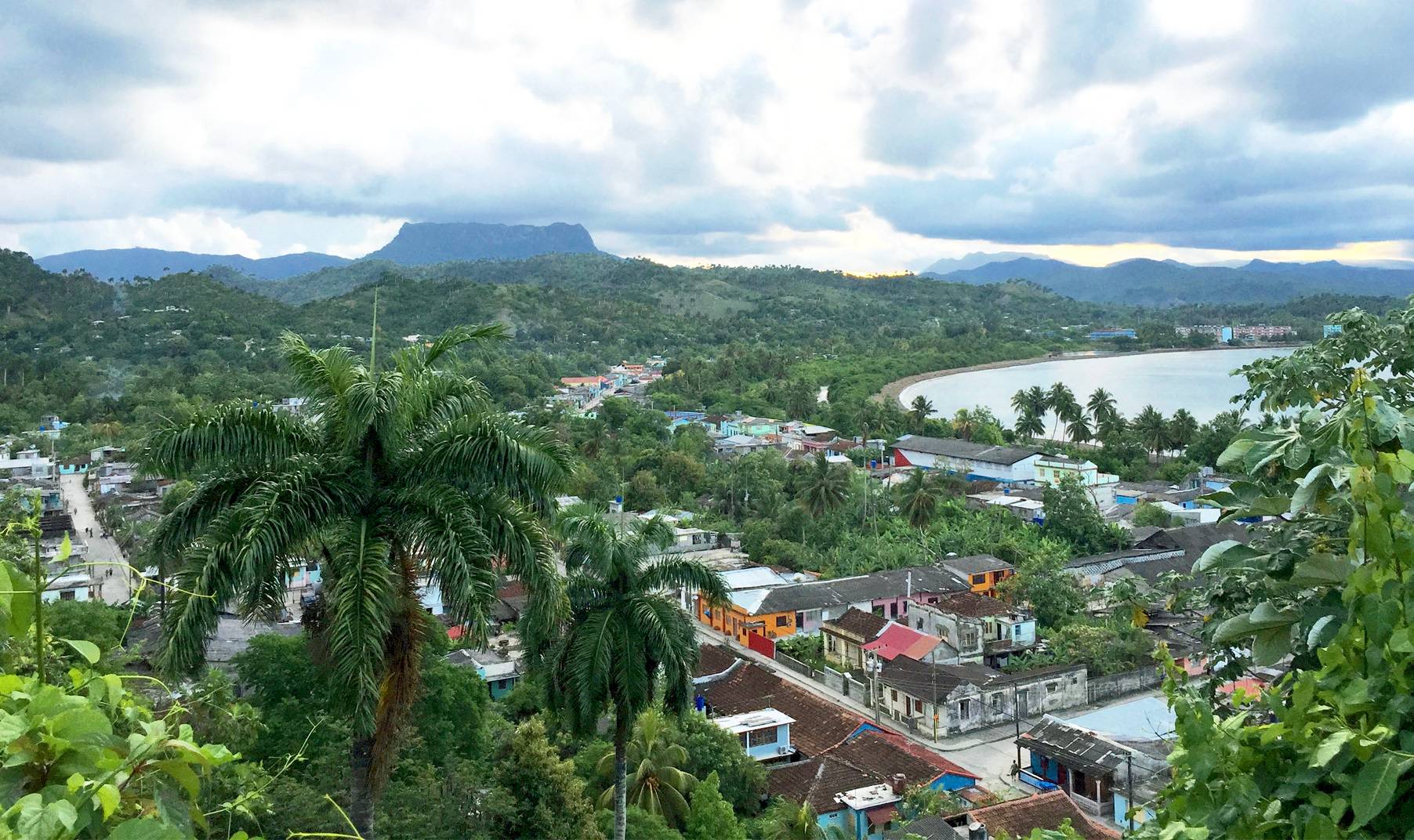 A view over the town of Baracoa, Cuba, with Yunke mountain in the background A view over the town of Baracoa, Cuba, with Yunke mountain in the background