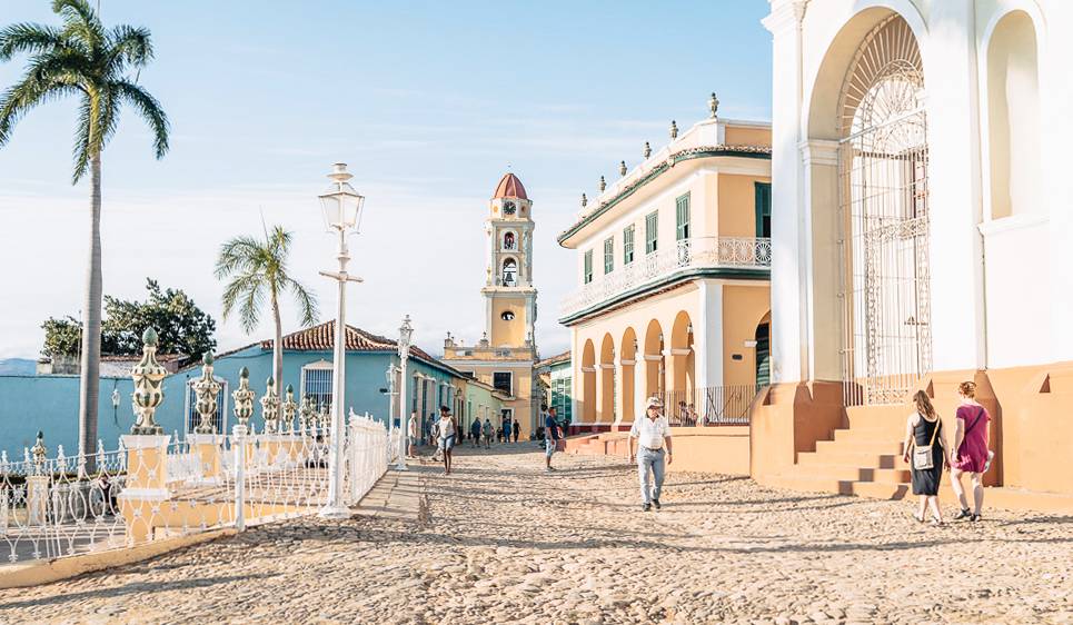 A view towards the bell tower across Plaza Mayor in Trinidad, Cuba A view towards the bell tower across Plaza Mayor in Trinidad, Cuba
