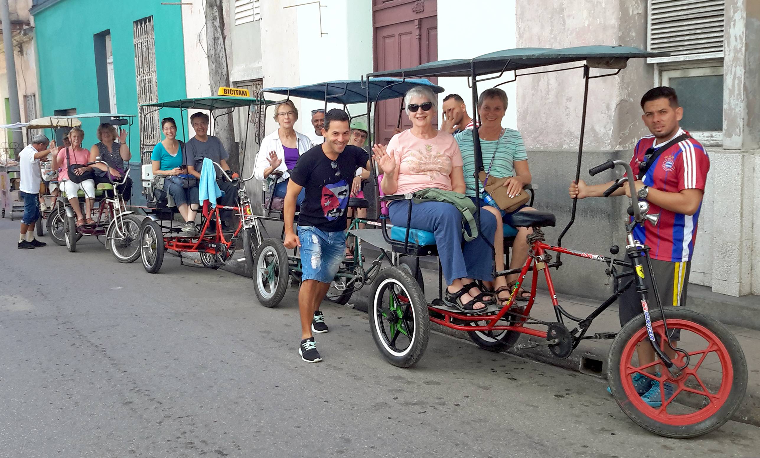 Bicycle taxis lined up for a tour around Camaguey Bicycle taxis lined up for a tour around Camaguey