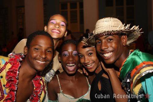 Children with dancers in Santiago de Cuba's Carnival Children with dancers in Santiago de Cuba's Carnival