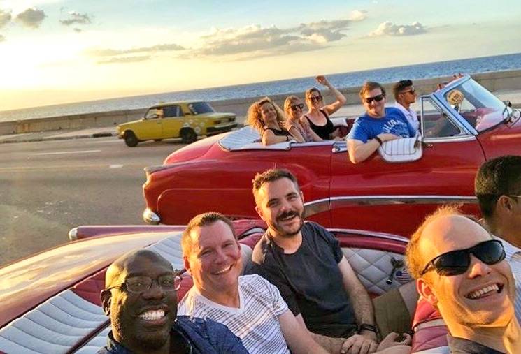 Classic American car riding along the Malecon in Havana Classic American car riding along the Malecon in Havana