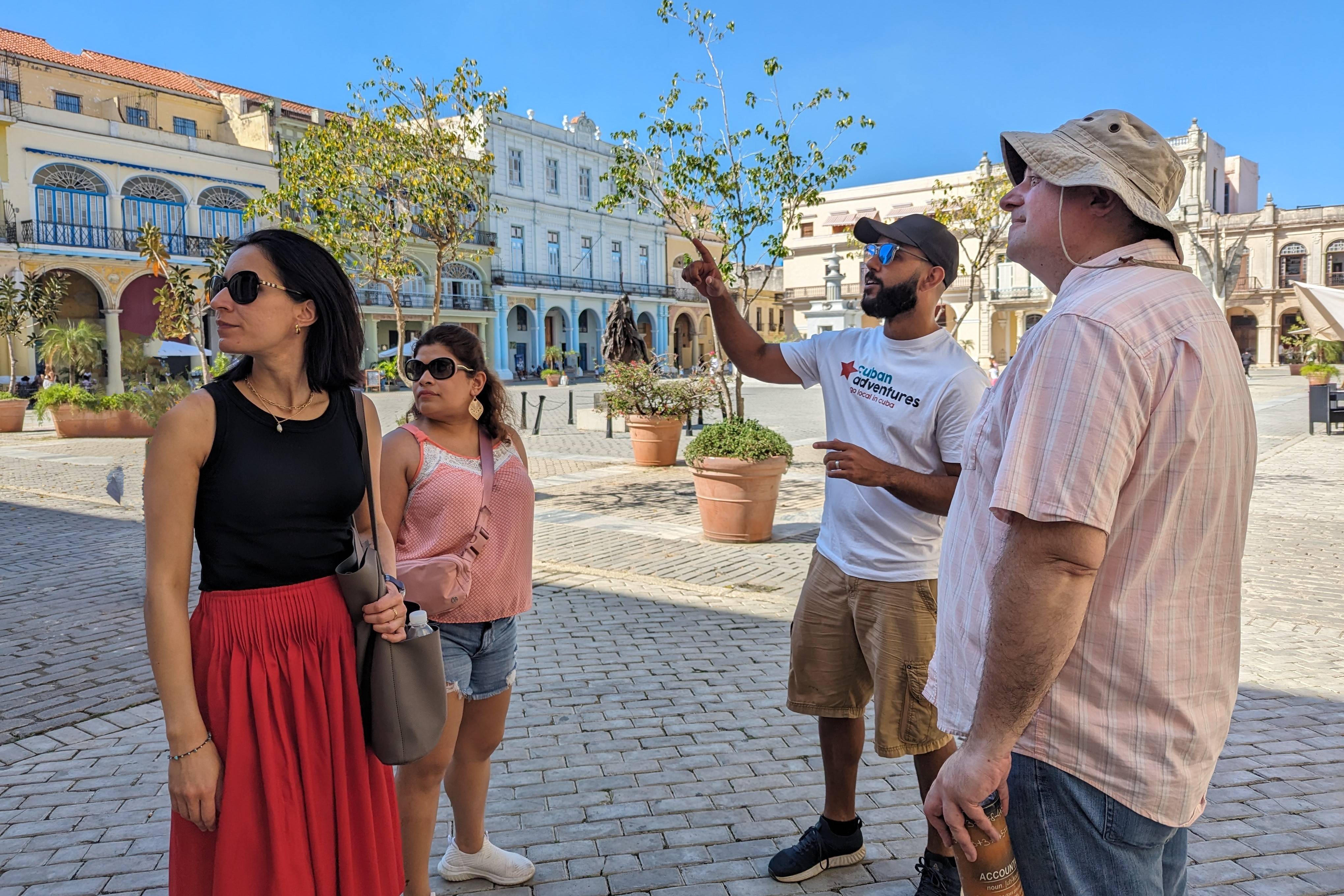 Cuban Adventures tour leader with group at Plaza Vieja Cuban Adventures tour leader with group at Plaza Vieja