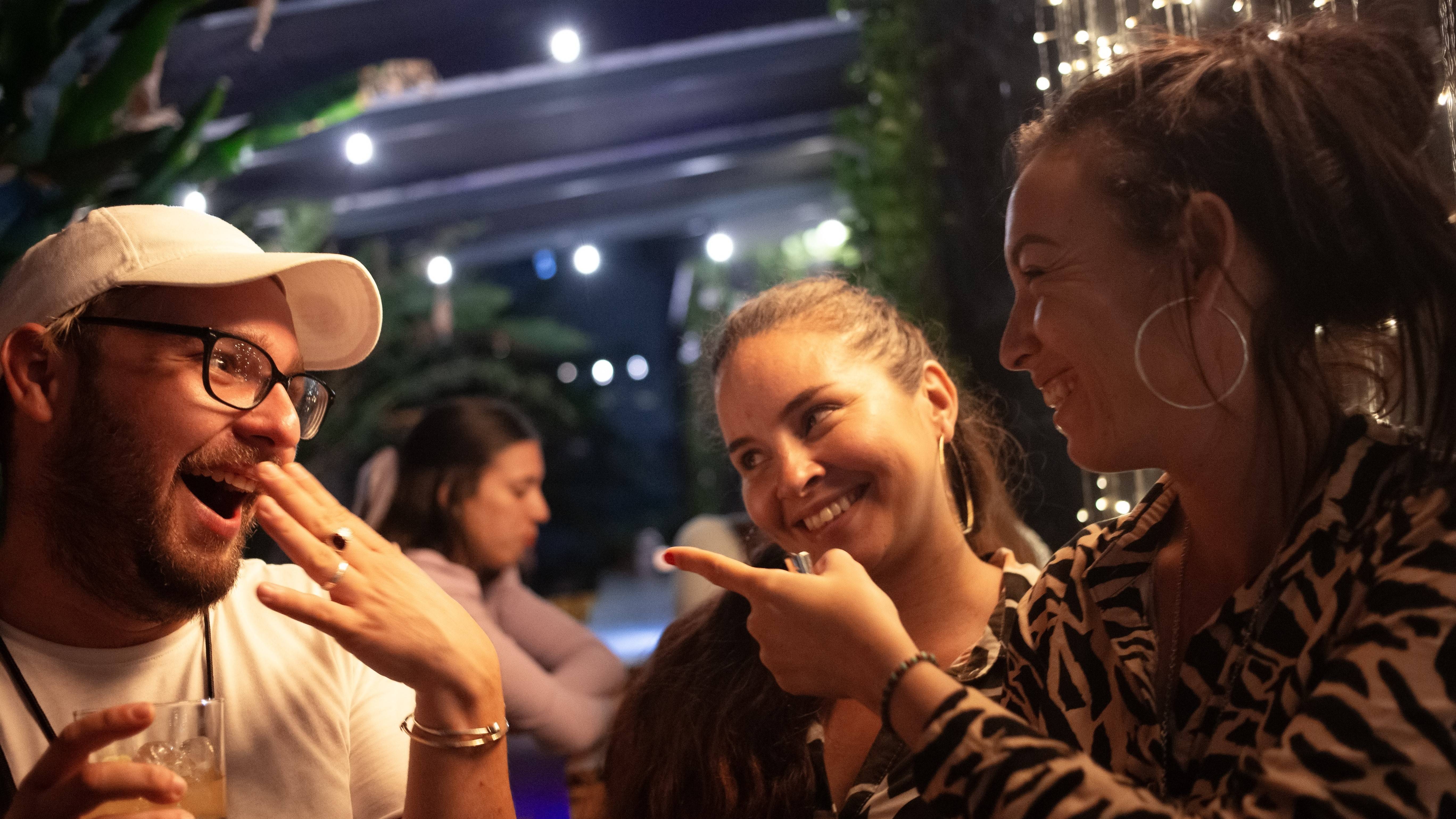 Enjoying conversation at a bar Enjoying conversation at a bar