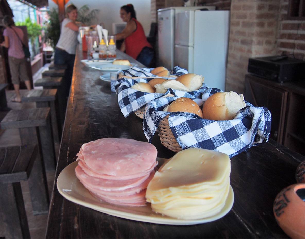 Every guesthouse has a slightly different breakfast. This one has slices of ham and cheese. Ham and cheese slices at a breakfast bar in Cuba