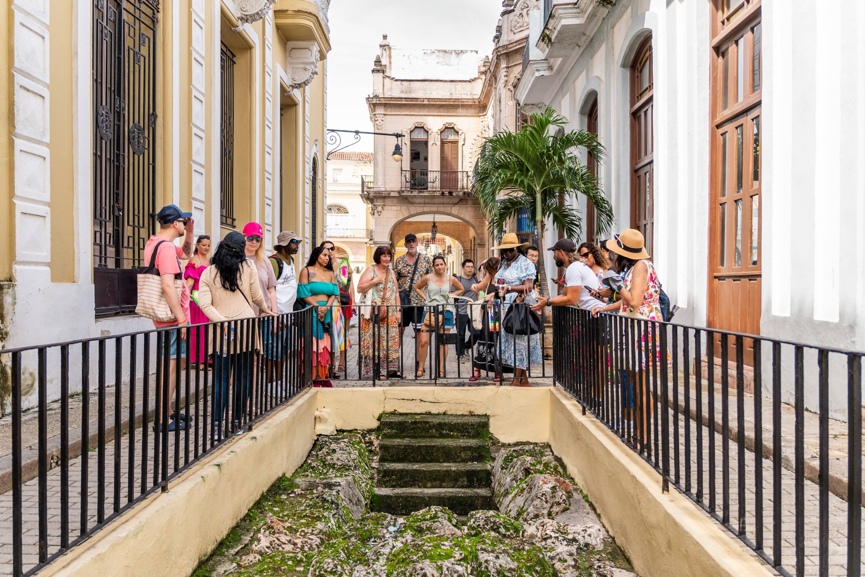 Group with tour leader by Old Havana Antique Sewers Group with tour leader by Old Havana Antique Sewers