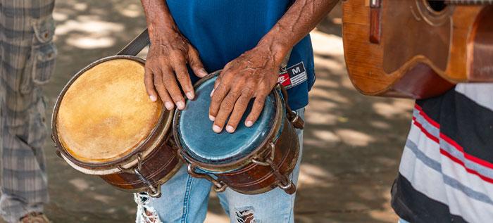 Man playing the bongos