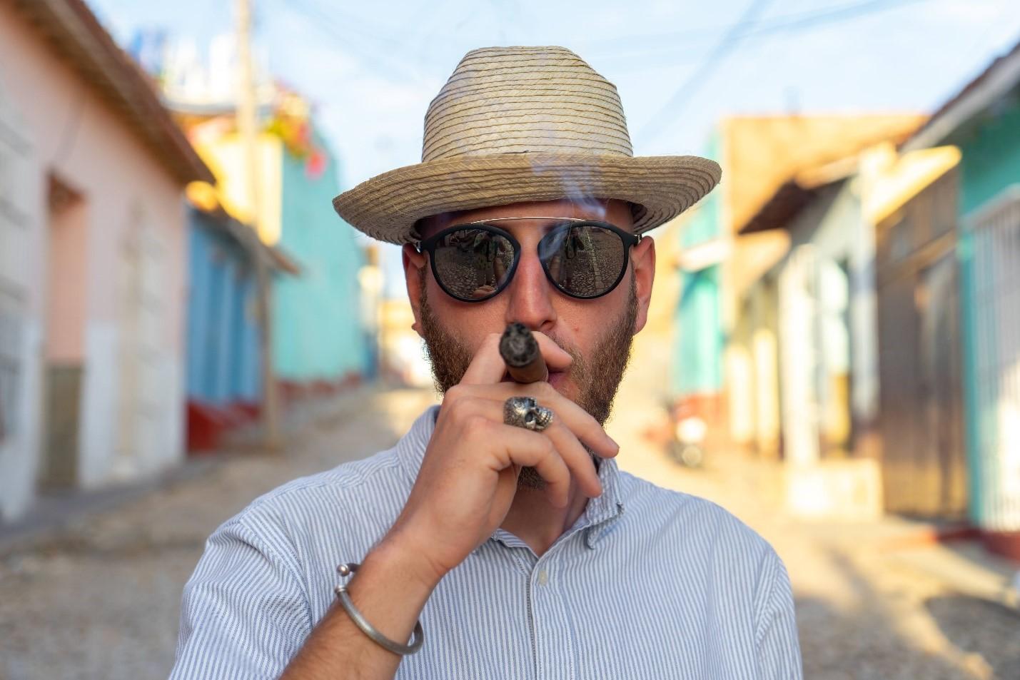 man smoking cigar in Trinidad Cuba man smoking cigar in Trinidad Cuba
