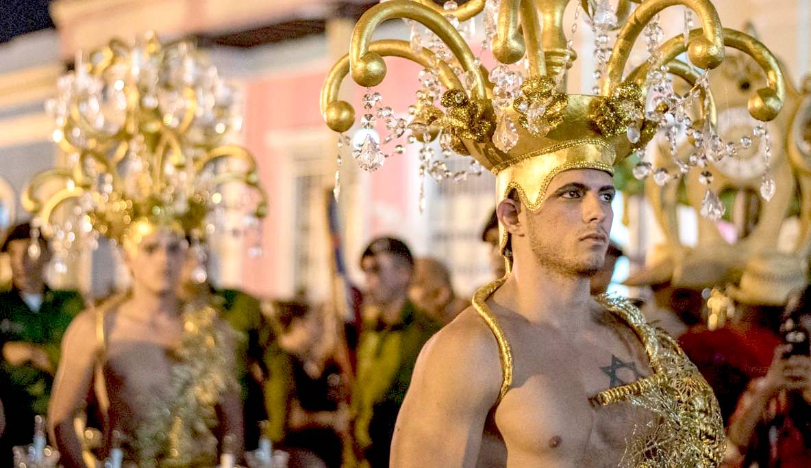 Men in costume parade as part of the Parandas de Remedios festival in Cuba