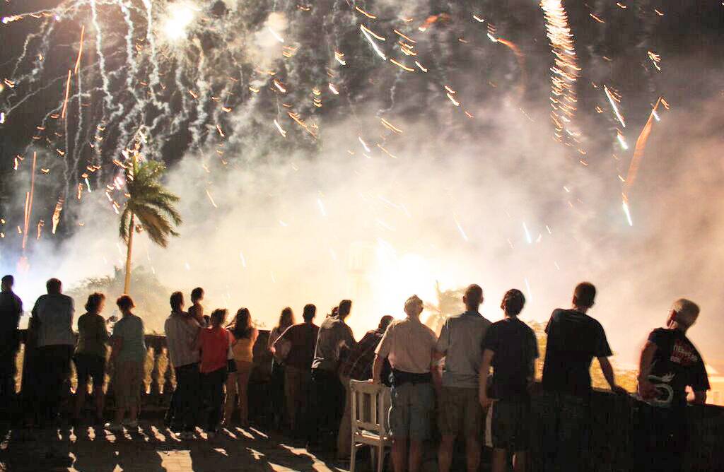 A Cuban Adventures tour group observes the fireworks at the Parrandas de Remedios festival
