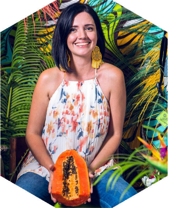 Photo Credit: Katy Ocaña portrait of designer Katy Ocaña wearing large and vibrant yellow dangly earrings