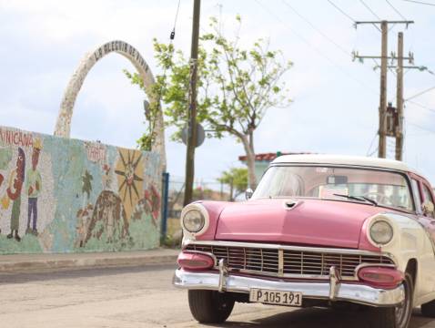 Pink car passing by Pink car passing by