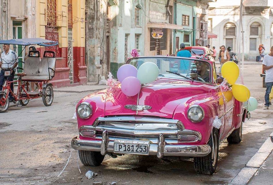 Pink classic cars are now also the most popular choice in Cuba for quinceanera celebrations. Pink classic cars are now also the most popular choice in Cuba for quinceanera celebrations.