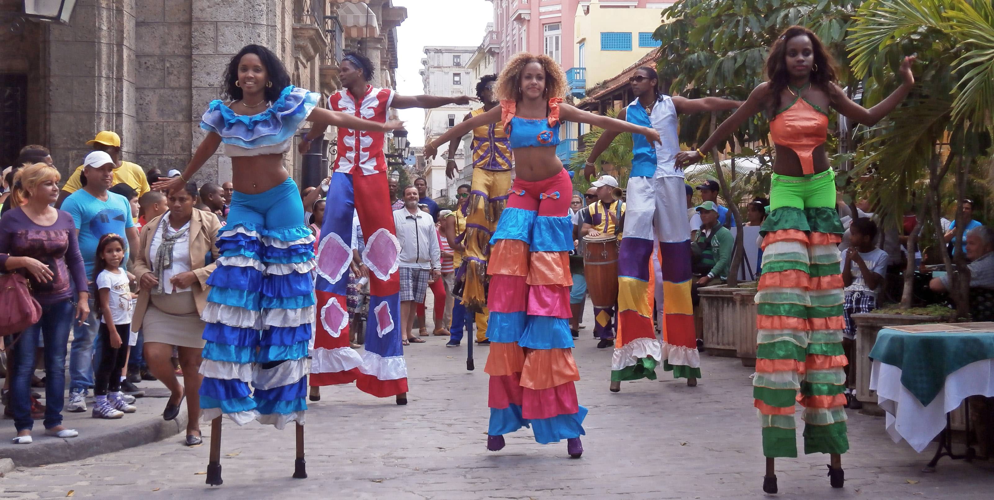Street performers on stilts in Old Havana, Cuba