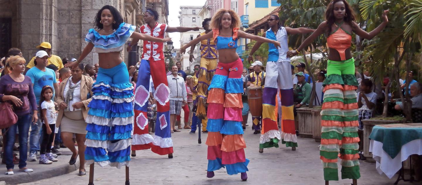 Street performers on stilts in Old Havana, Cuba