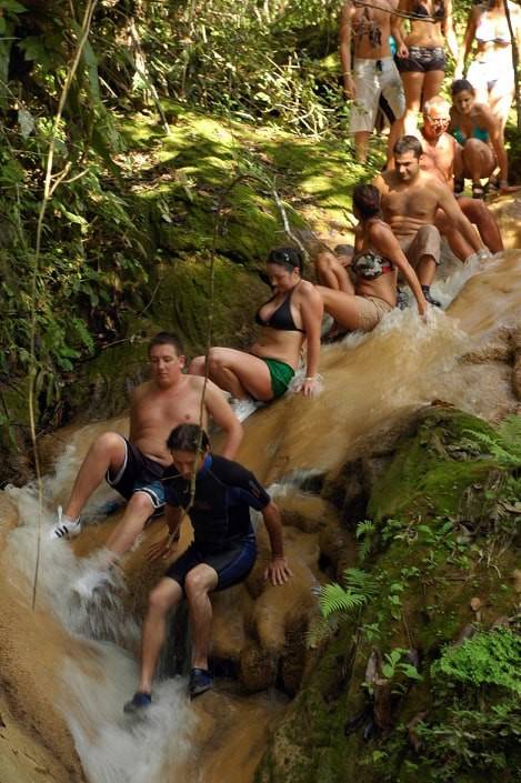 The Rambo trail will satisfy your craving for adventure adventurers slide down a natural water slide