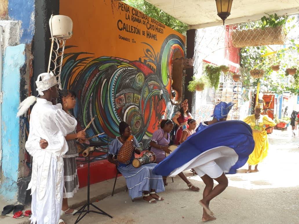 The Sunday rumba party is fun and completely free Image Source: Yanet Lacaba/Big Planet Adventures Female percussionists play and a woman representing Yemaya dances barefoot, her blue dress twirled around in a high arc