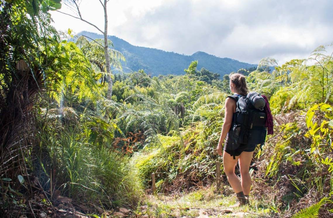 A woman treks along the trail towards Pico Turquino, Cuba
