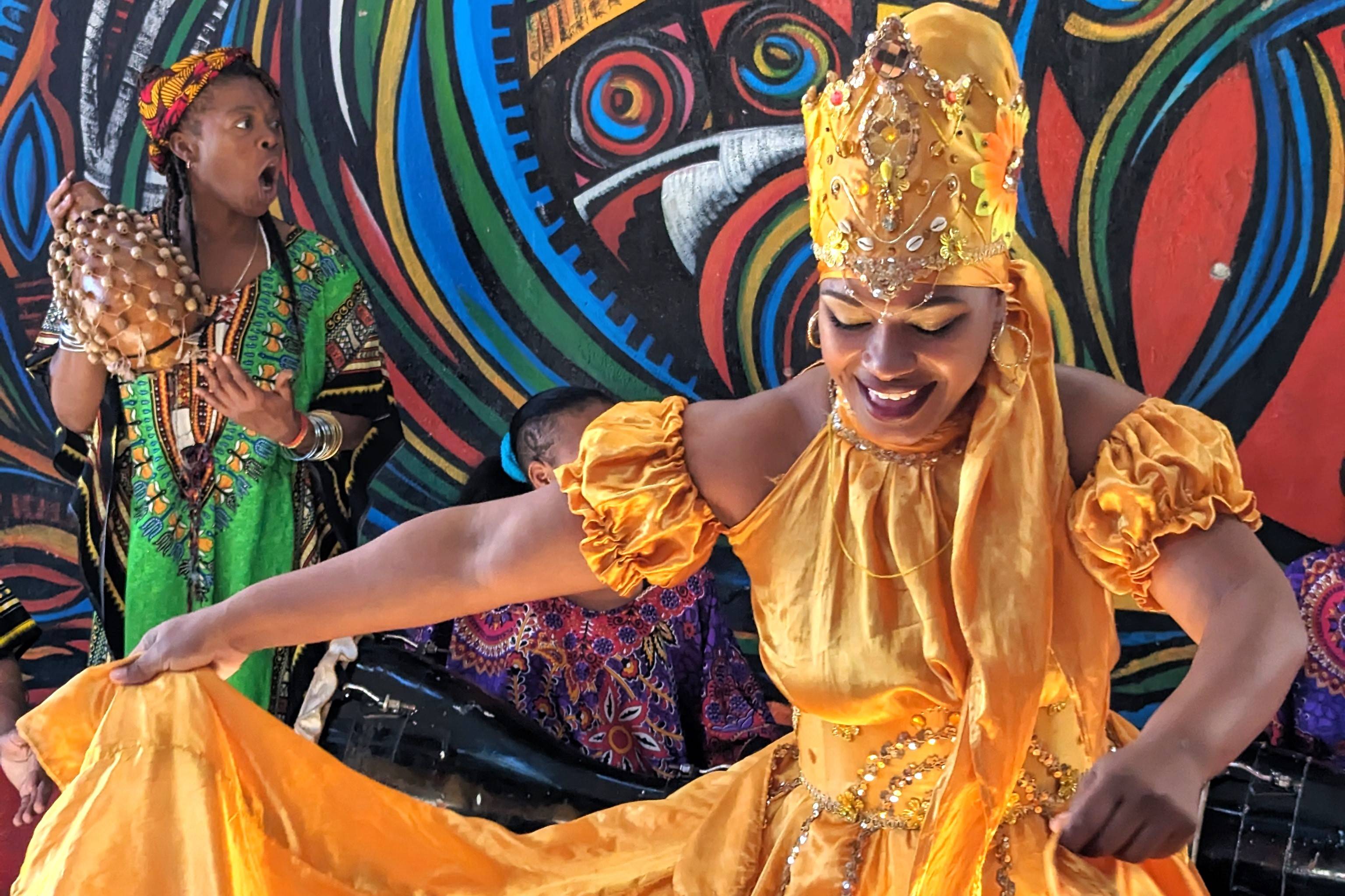 Woman dancing in yellow dress Woman dancing in yellow dress