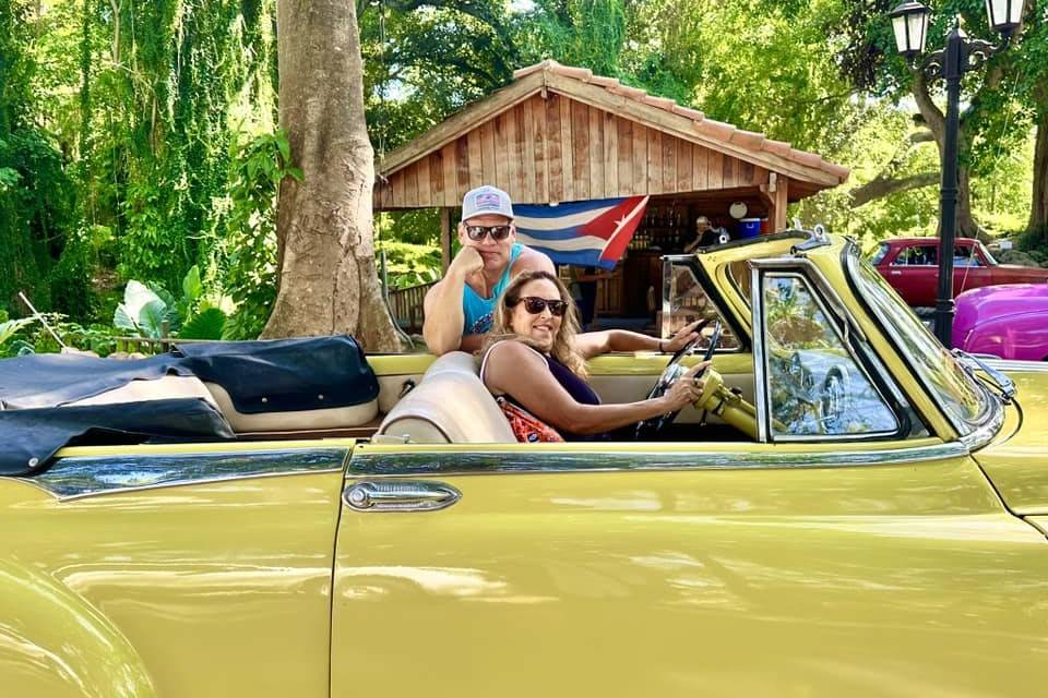 Woman in yellow car Woman in yellow car