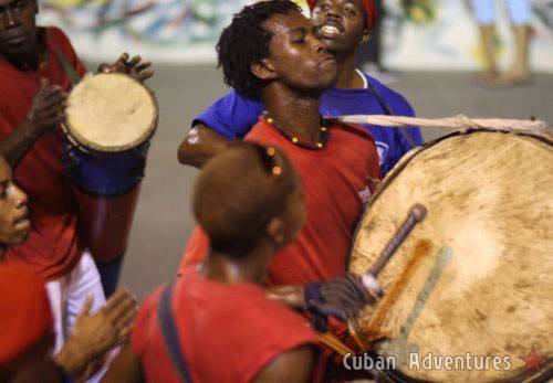 Young man playing the drums in Santiago de Cuba's Carnival Young man playing the drums in Santiago de Cuba's Carnival